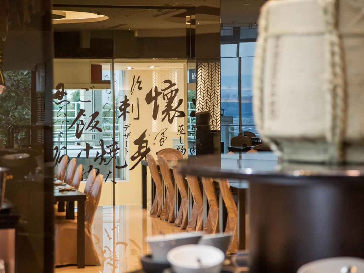 Freshfields Hotel Taichung Exterior photo Interior of a Starbucks Reserve store in Shanghai, China